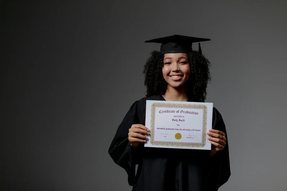 Woman holding a diploma