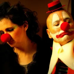 Man and woman in costumes of clowns